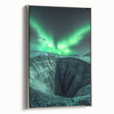 Framed canvas artwork showcasing a stunning landscape with caves, highlighted by a sleek silver frame. Ideal for modern home decor, enhancing any living space.