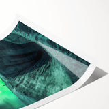 Stunning rolled print showcasing a vibrant landscape with intricate cave formations, perfect for wall decor, carefully packaged in a protective cardboard tube.