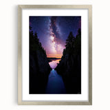 Framed landscape artwork showcasing dramatic cliffs and vibrant colors, featuring a silver mat border for an elegant display, ideal for home decor.