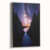 Framed canvas artwork showcasing a stunning cliff landscape with vibrant colors and intricate details, featuring a sleek silver frame that enhances its elegance. Ideal for modern home decor.