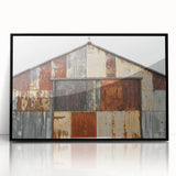 A sleek black-framed acrylic landscape art piece showcasing a serene barn scene, perfect for home decor, emphasizing rustic charm and tranquility.
