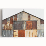 Front view of a stretched canvas depicting a serene landscape with a rustic barn, showcasing vibrant colors and intricate details, perfect for home decor.