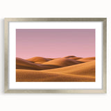 Silver-framed landscape artwork featuring a serene countryside scene with vibrant green fields and a clear blue sky, showcasing intricate details and a classic mat design.