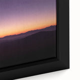 Close-up of a framed desert landscape canvas art piece showcasing warm earthy tones, textured details, and vibrant sunlit hues, perfect for home decor.