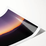 Desert landscape rolled canvas print showcasing vibrant orange and gold hues, featuring undulating dunes under a clear blue sky, ideal for home decor.