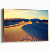 Framed canvas artwork showcasing a serene desert landscape with golden dunes under a clear blue sky, ideal for modern home decor and interior design.