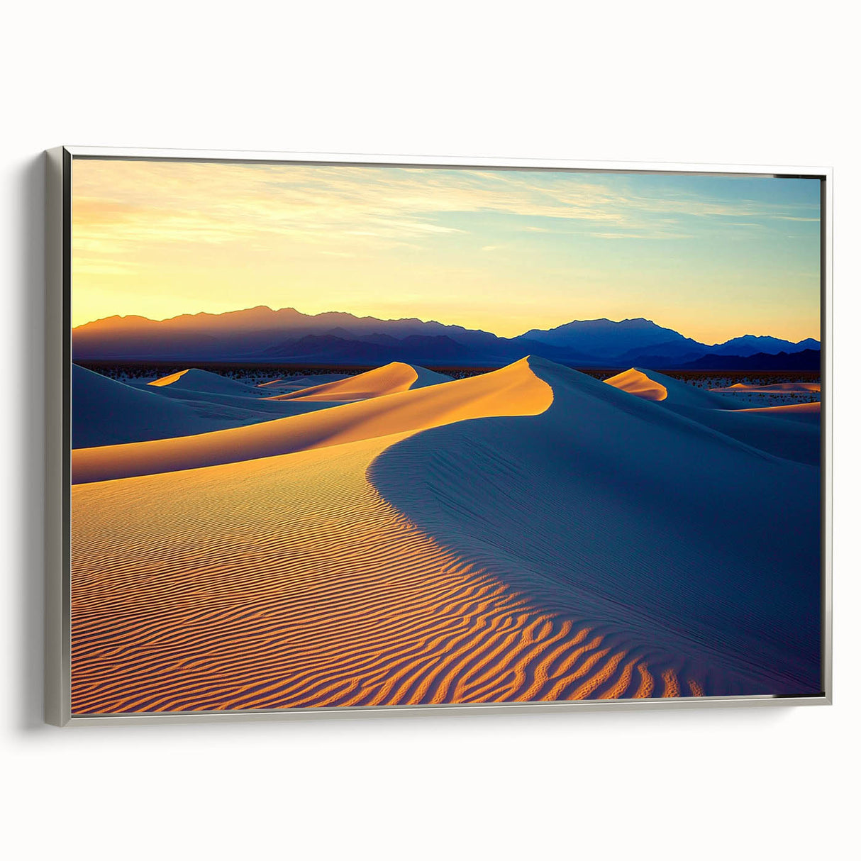 Framed canvas art showcasing a serene dune landscape, featuring soft beige and sandy tones with a sleek silver frame, perfect for modern home decor.