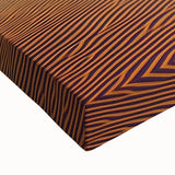 Close-up of a stretched canvas featuring an intricately designed landscape of sand dunes, showcasing warm earthy tones and texture, perfect for modern home decor.