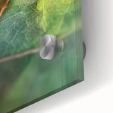 Large abstract floral design in vibrant colors on acrylic glass, ideal for dining room art in a mid-century modernist style.