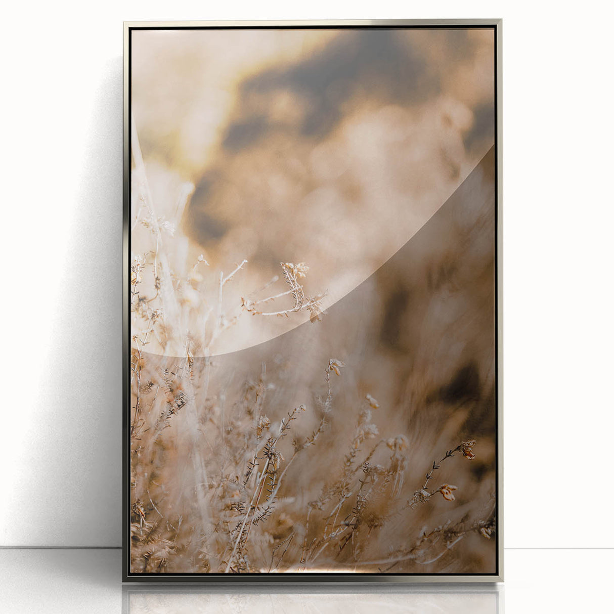 Mid-century modernist art depicting an abstract fall landscape in warm orange and brown tones, framed in silver acrylic.