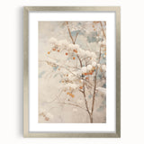 Textured abstract art print depicting a winter scene in muted blue and white tones, framed in silver.