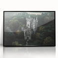 Framed acrylic artwork of a majestic castle landscape, showcasing rich colors and intricate details, set against a black frame for a modern aesthetic.