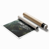 Rolled print showcasing a vibrant landscape with a majestic castle surrounded by lush greenery and a serene sky, perfect for home decor or art enthusiasts.