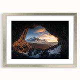 Framed landscape artwork depicting a serene cave scene, featuring a silver mat and elegant frame, perfect for enhancing modern home decor.