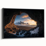Framed canvas artwork depicting a stunning landscape with caves, presented in a sleek black frame. Ideal for enhancing modern home decor with natural scenery.