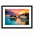 Framed landscape art print showcasing dramatic cliffs in vivid colors, set in a sleek black frame with a white mat, ideal for modern home decor.