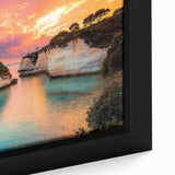 Close-up of a framed canvas showcasing a dramatic cliffside landscape with rich colors and intricate details, perfect for home decor enthusiasts seeking nature-inspired art.