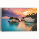 Stretched canvas artwork showcasing a breathtaking landscape of towering cliffs against a vibrant sunset sky, perfect for home decor enthusiasts seeking nature-inspired designs.