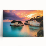 Stretched canvas artwork depicting a dramatic landscape of cliffs under a vibrant sunset, showcasing rich colors and intricate textures, perfect for home decor.