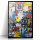 Framed acrylic artwork showcasing a vibrant abstract design with colorful splatters on a black background, perfect for modern home decor and artistic expression.