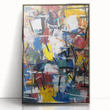 Framed acrylic artwork showcasing an abstract design with colorful splatters, elegantly presented in a sleek silver frame, ideal for modern home decor.