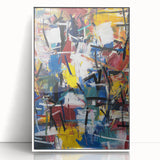 Framed abstract art piece showcasing vibrant color splatters on a white background, perfect for modern home decor. Ideal for adding a contemporary touch to living spaces.