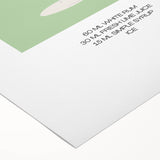 Art deco poster featuring a stylized cocktail glass in bold black and gold tones on a rolled canvas.