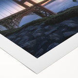 Rolled canvas artwork showcasing a vibrant landscape bridge scene with rich colors and intricate details, expertly packaged in a protective tube for easy transport.