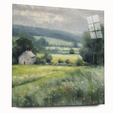 Landscape wall art depicting a serene countryside scene with vibrant green fields and a blue sky, displayed in a sleek acrylic frame, enhancing home decor.
