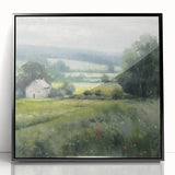Framed acrylic wall art depicting a serene countryside landscape with lush green fields and a clear blue sky, showcasing a modern black frame for elegant home decor.