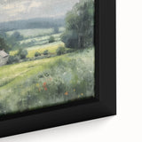 Framed landscape wall art of a serene countryside scene, highlighting lush green fields and a vibrant sunset, perfect for home decor or office ambiance.