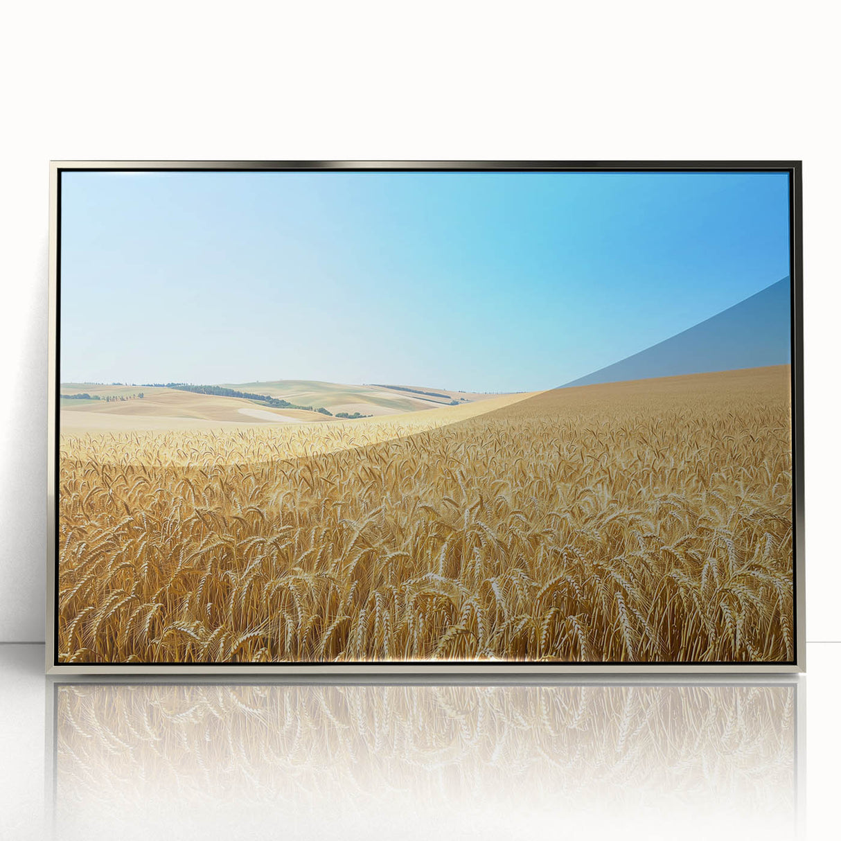 Framed acrylic artwork showcasing a serene countryside landscape, featuring vibrant green fields and a clear blue sky, ideal for home decor.