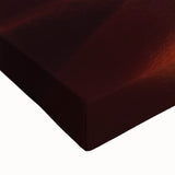 Close-up of a stretched canvas artwork depicting a vibrant desert landscape, showcasing rich colors and intricate details, ideal for home decor or art enthusiasts.