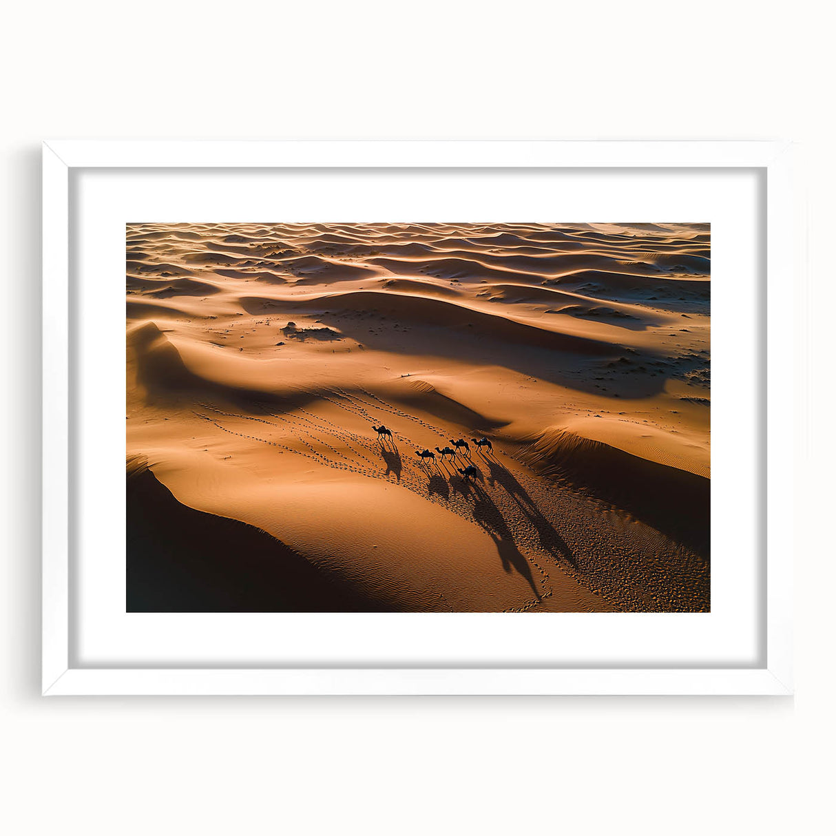 Framed landscape artwork showcasing serene sand dunes with a white mat, perfect for home decor, enhancing any room's aesthetic with a touch of nature.