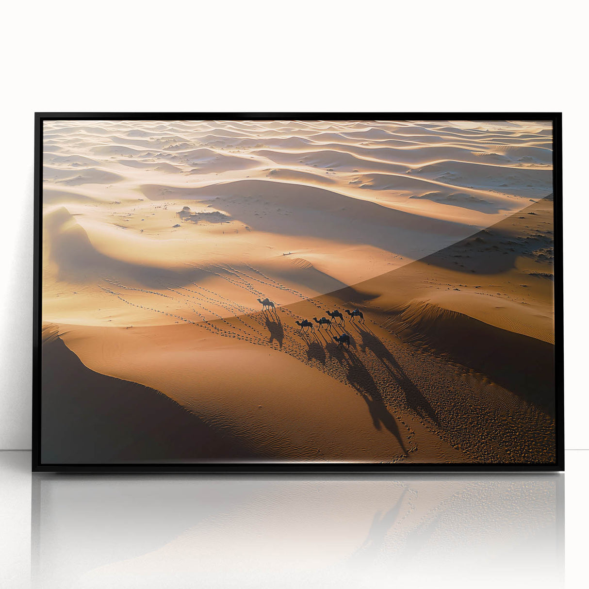 Framed acrylic artwork showcasing a stunning landscape of rolling dunes, presented in a sleek black frame, perfect for modern home decor and art enthusiasts.