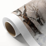 Rolled canvas showcasing a vibrant landscape design with rich colors and intricate details, elegantly packaged in a durable cardboard tube for safe delivery.