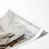 Rolled landscape art print showcasing a vibrant sunset over mountains, featuring warm hues of orange and purple, packaged securely in a protective cardboard tube.