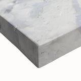 Close-up view of a stretched canvas artwork depicting vibrant landscapes, showcasing rich colors and intricate details, ideal for home decor or art collectors.