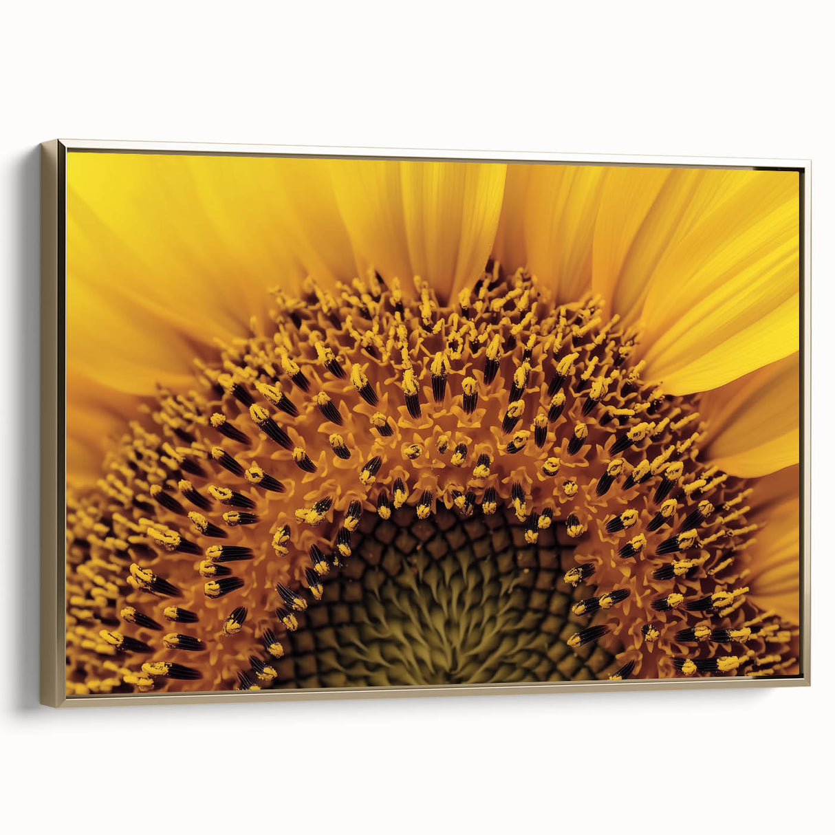 Framed canvas featuring a close-up floral design in gold and black tones, suitable as wall art for a bedroom.