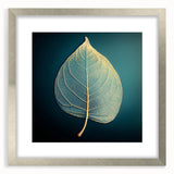 Textured art print of abstract green leaves, framed in silver, ideal for bedroom wall decor.