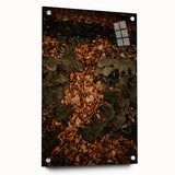 Large abstract wall art depicting fall scenery in orange and brown tones on acrylic glass, ideal for dining room decor.