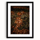 Extra large abstract art print with vibrant autumn hues on textured canvas, framed in black, ideal for living room decor.