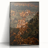 Mid-century modernist art depicting fall foliage in muted orange and brown tones on a framed acrylic print.