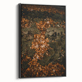 Black and white framed canvas featuring a vintage-style landscape painting of an autumn scene, ideal for bedroom decor.