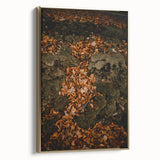 Framed canvas wall art featuring a vintage-style landscape painting with autumn trees in gold and black tones.