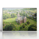 Framed acrylic artwork showcasing a serene landscape with a majestic castle, set against a vibrant sky. The white frame enhances the scene's elegance, making it a perfect addition to home decor.