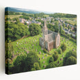 Stretched canvas artwork depicting a scenic landscape with a majestic castle surrounded by lush greenery, showcasing vibrant colors and intricate details, ideal for home decor.