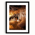 Black framed landscape artwork featuring a cave scene, elegantly matted for added depth. Ideal for home decor, this piece enhances any interior aesthetic.