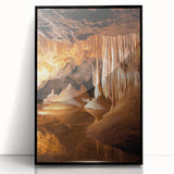 Framed acrylic artwork showcasing a stunning cave landscape with rich colors and intricate details, set in a sleek black frame, perfect for enhancing modern decor.