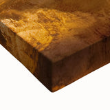 Close-up of a vibrant landscape canvas print depicting intricate cave formations, showcasing rich earth tones and textured details, ideal for home decor.